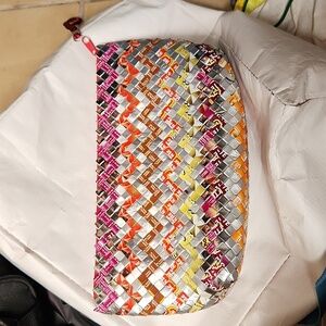 Recycled handed woven clutch